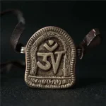 Amulette ancienne, objet sacré de la culture tibétaine
