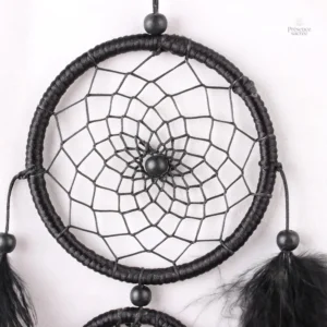 Capteur de rêves noir avec design artisanal unique