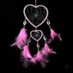 Attrape rêve plume rose délicat pour une décoration apaisante