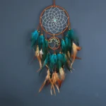 Attrape rêve turquoise avec plumes décoratives