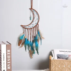 Capteur de rêves turquoise orné de plumes