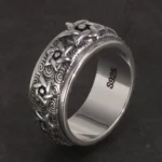 Bague de prière bouddhiste tournante en métal