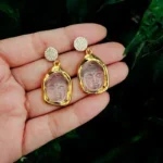 Boucles d'oreilles en or avec motif Bouddha