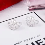 Bijoux boucles d'oreilles lotus avec perles brillantes