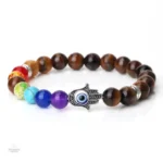 Bracelet en pierres 7 chakras avec design Hamsa