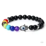 Bijou équilibrant Hamsa avec sept pierres chakra