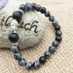 Bijou spirituel en agate avec motif de Bouddha