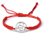 Bracelet en rouge avec symbole Ohm, accessoire spirituel