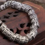 Bracelet Tibétain en cuivre blanc, motif Om