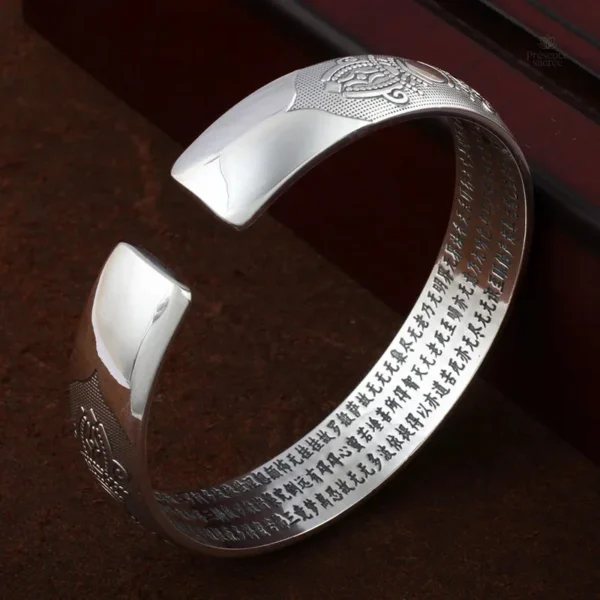 Bracelet en argent, motifs tibétains authentiques