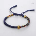 Bracelet moine tibétain tressé en noir et jaune