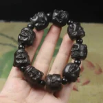 Bracelet Bouddha en bois avec tête de Bouddha élégante