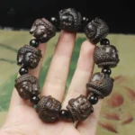 Accessoire spirituel : bracelet en bois représentant Bouddha