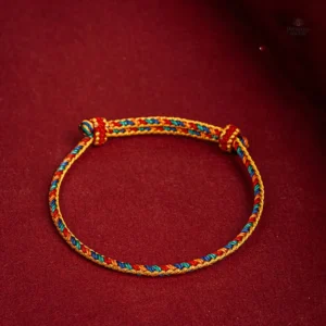 Bijou tibétain tressé mettant en avant l'artisanat