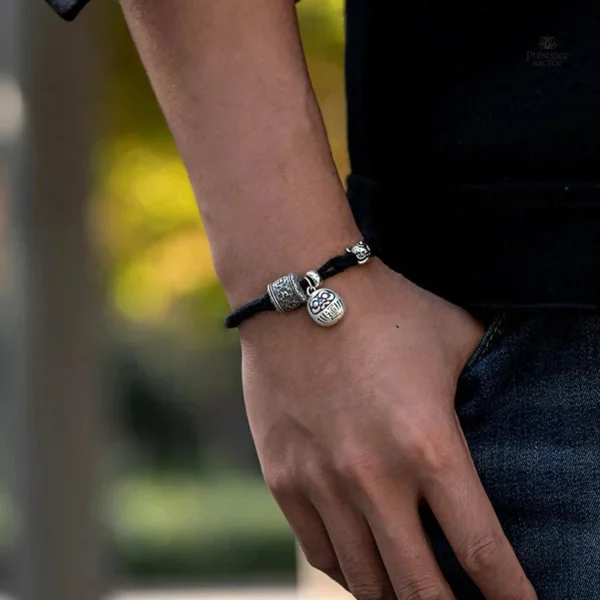 Bracelet avec breloques en cuivre et finition noire