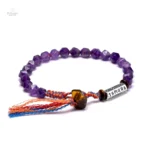 Bracelet spirituel tibétain, améthyste et symbole Om