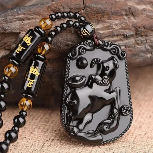 Bijou méditatif : collier en obsidienne Bouddha