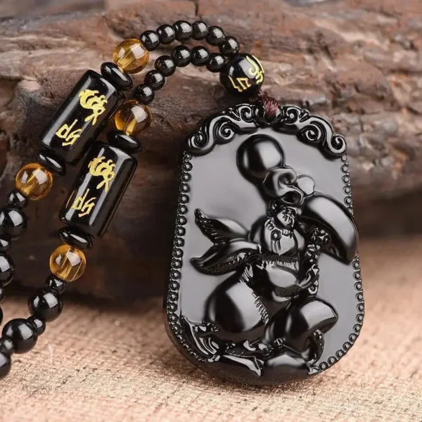 Accessoire religieux : collier obsidien Bouddha Avalokiteśvara