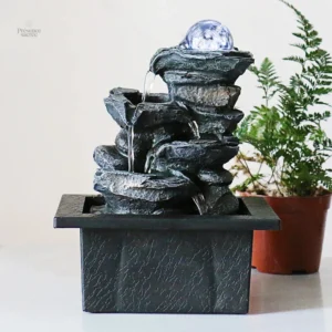 Fontaine zen avec jeux d'eau apaisants en intérieur