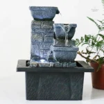 Décoration zen moderne avec fontaine créant une ambiance sereine