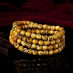 Collier Mala en bois, design crane tibétain authentique