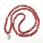 Bracelet mala en régalite rouge, essentiel pour la relaxation
