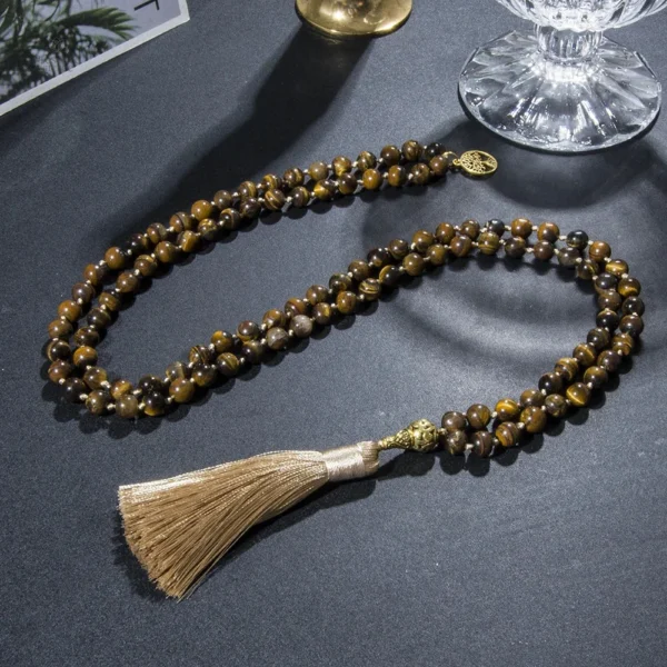 Mala en Oeil du Tigre, symbole de protection et de force