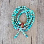 Mala tibétain avec perles en turquoise vibrantes