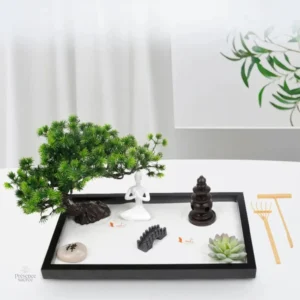 Détails du mini jardin zen avec statue de Bouddha