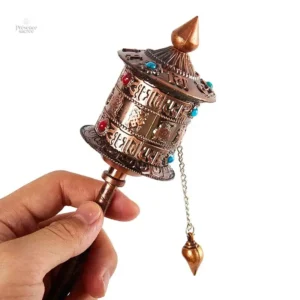 Moulin à prière tibétain en bois sculpté
