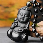 Pendentif noir Bébé Bouddha, symbole de paix