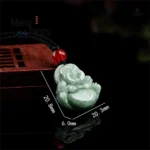 Pendentif avec double relief de Bouddha