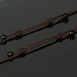 Collier Bouddha avec pendentif sculpté en Oeil de Tigre