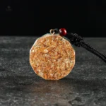 Pendentif artisanal en obsidienne, design sacré