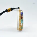 Pendentif chakras en orgonite, équilibre et harmonie spirituelle