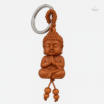 Porte-clés Bouddha en bois de pêche, symbole de sérénité