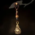 Porte-clés artisanaux Bouddha rieur