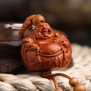 Porte-clés Bouddha Rieur en bois de pêche artisanal