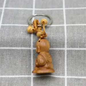 Accessoire zen : porte-clés mini-Bouddha, symbole de sérénité