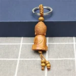 Porte-clés unique, petit Bouddha en bois décoratif