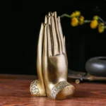 Décoration intérieure : deux mains de Bouddha en résine