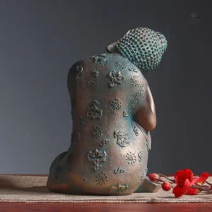 Figure de Bouddha endormi, finition en résine élégante
