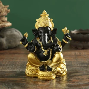 Ganesh en noir et or, symbole de prospérité