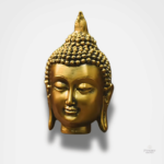 Tête de Bouddha dorée, symbole de sérénité et de méditation