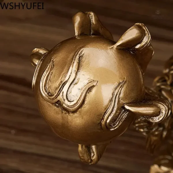 Dragon majestueux en résine, finition dorée élégante