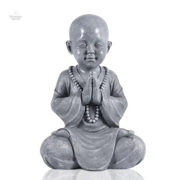 Moine méditant en statuette, inspiration pour la méditation