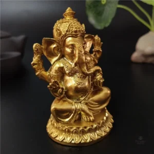 Statue de Ganesh sur lotus, représentation artistique spirituelle